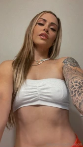 Lifting my tube top up more for a better view when i reach my goal