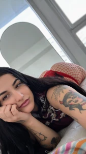 Go ahead zoom in to see my scrumptious ass in red fishnets get