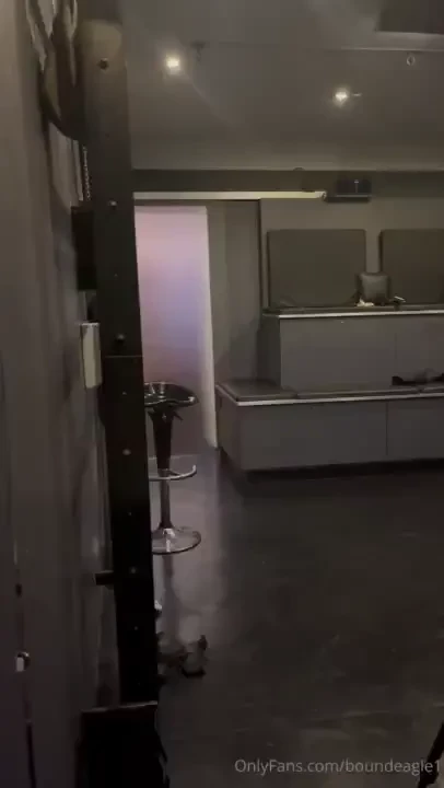 Full leather smoke with slave caged behind me 