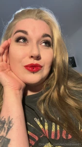 A touch of red on my lips a touch of magic in my life