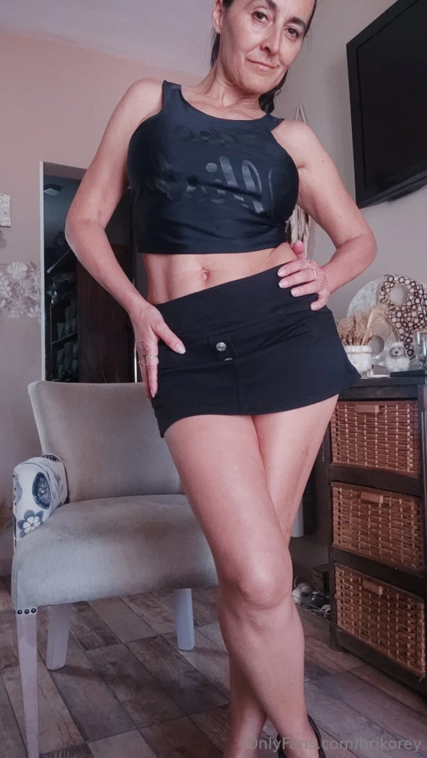 With this top that insinuates and a short skirt that lets the 