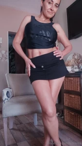 With this top that insinuates and a short skirt that lets the