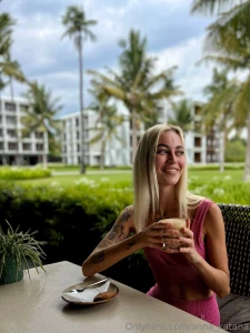 A cup of latte in the fresh air is not only a pleasant morning delight