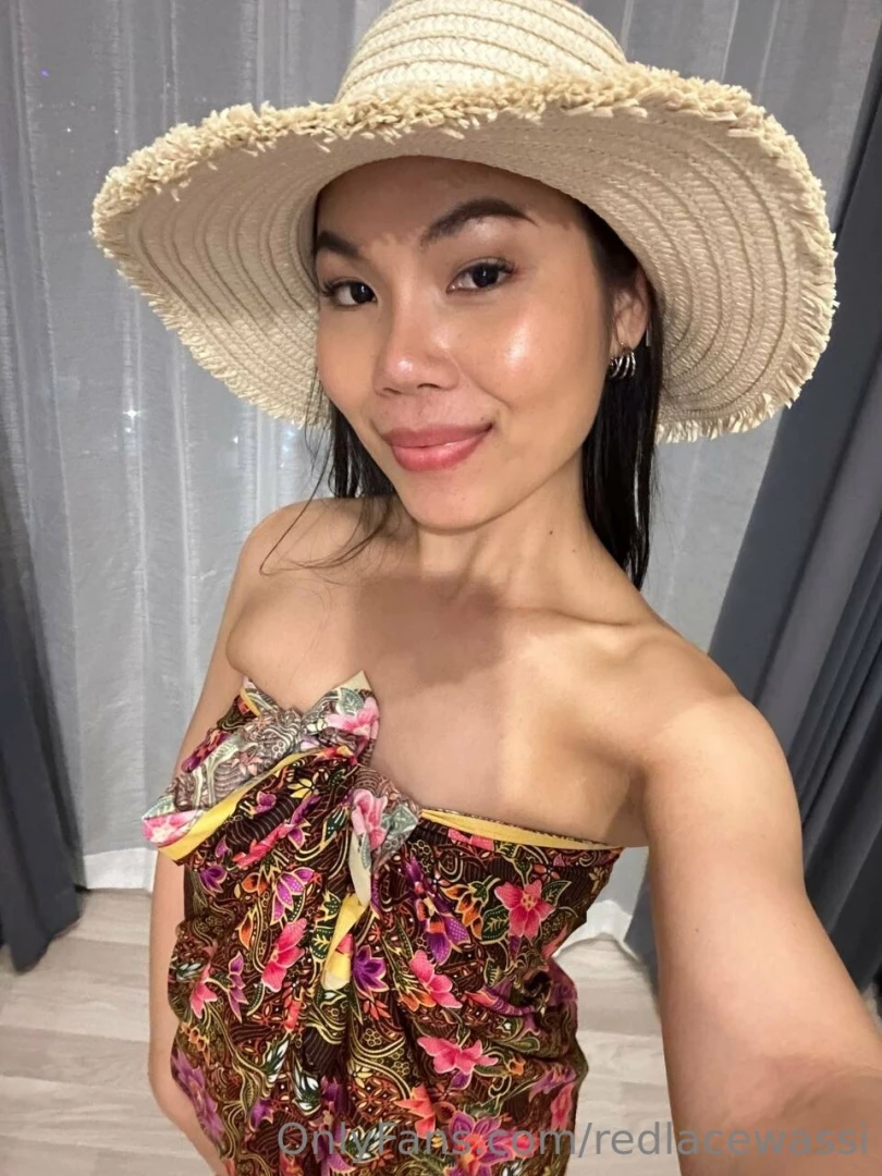 Thai dress along with a cute american hat east and west together are 