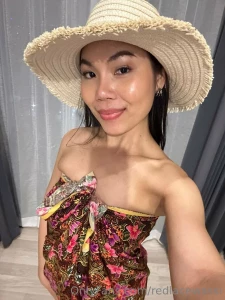 Thai dress along with a cute american hat east and west together are