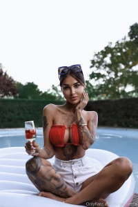 I love spending time near the pool would you like to join