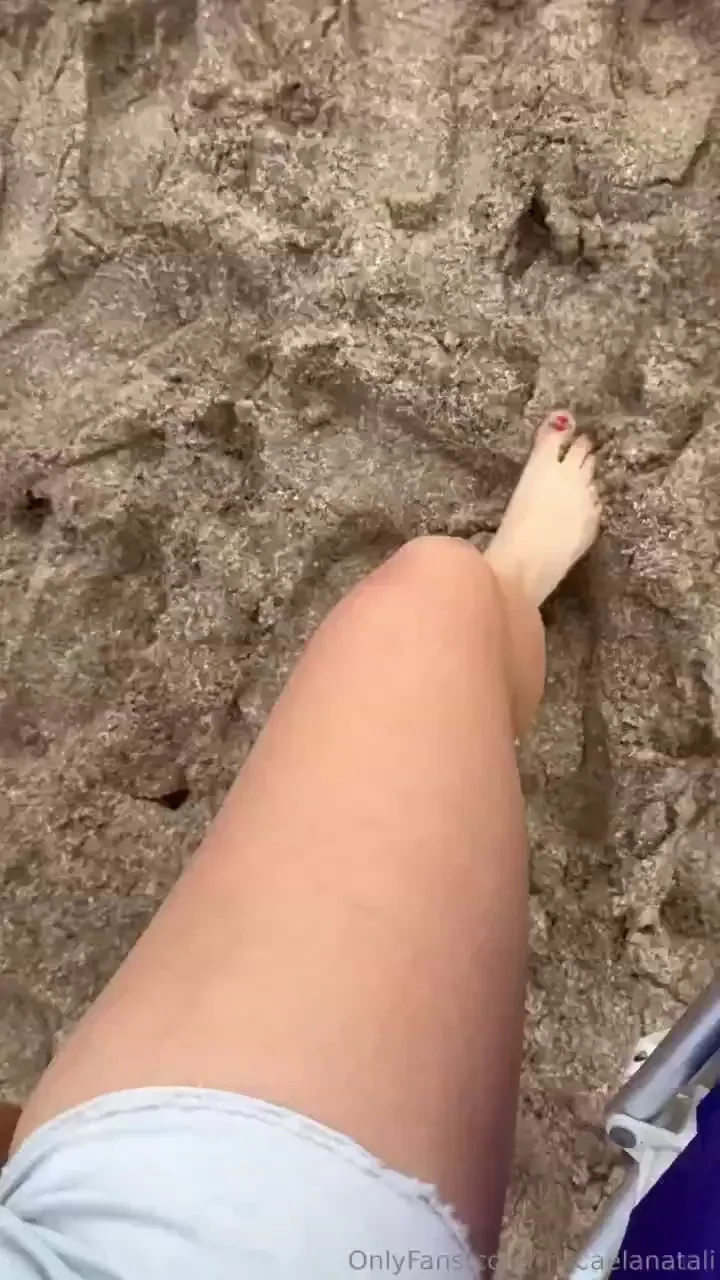 My feet in the beach sand and the sea red nails part 1 