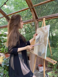 When i look at this painting i realize that my reflection in it is not