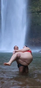Having fun in the waterfall