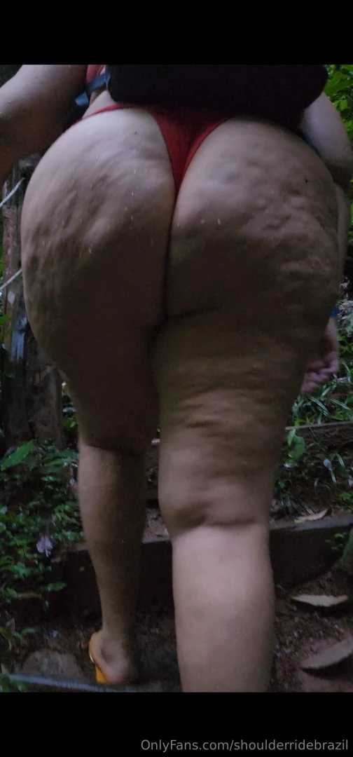 Following big butt in red thong bikini in the trail 