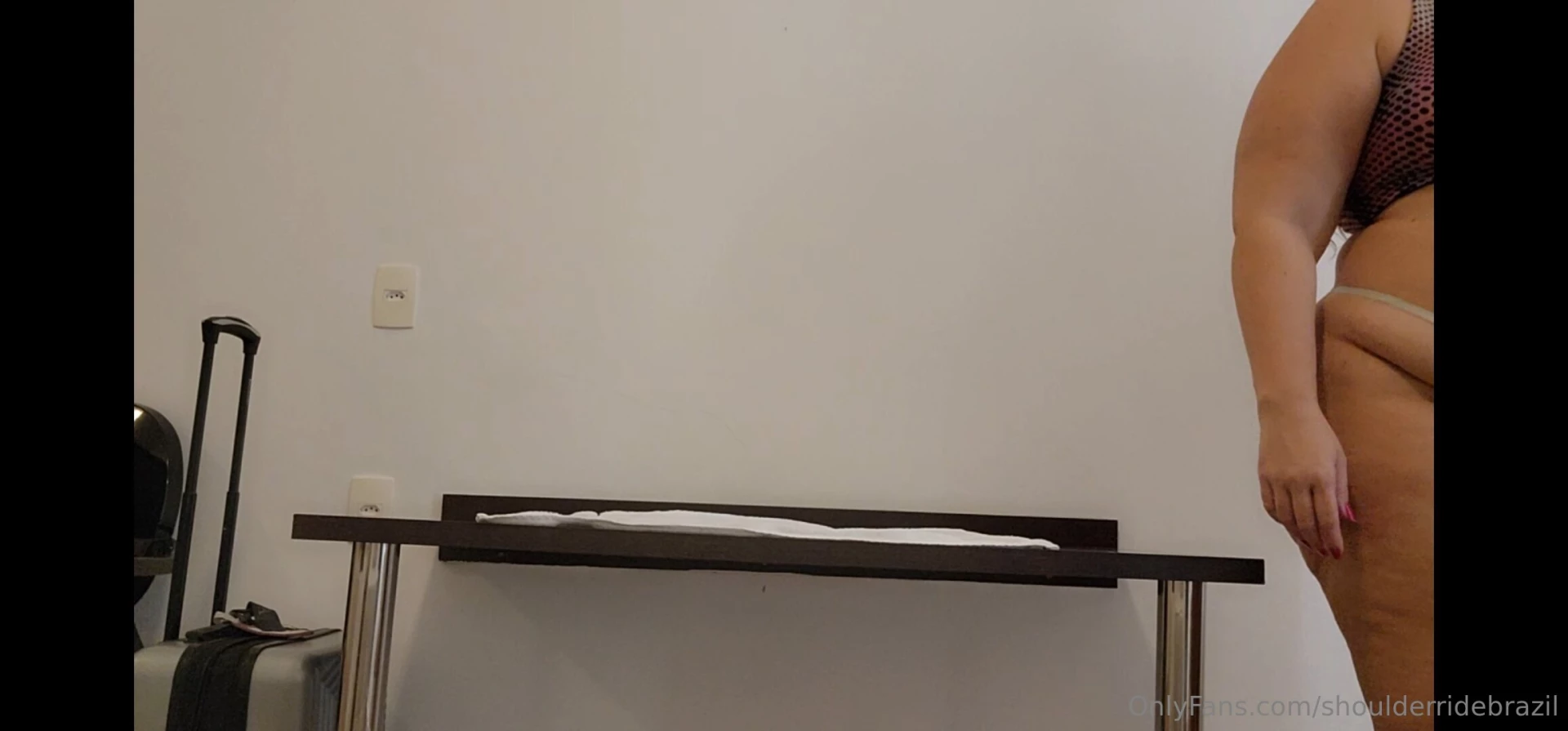 Girlfriend bending the hotel desk table full weight 