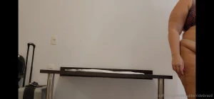 Girlfriend bending the hotel desk table full weight