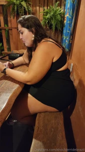 Following huge butt going up the stairs in very tight beach dress