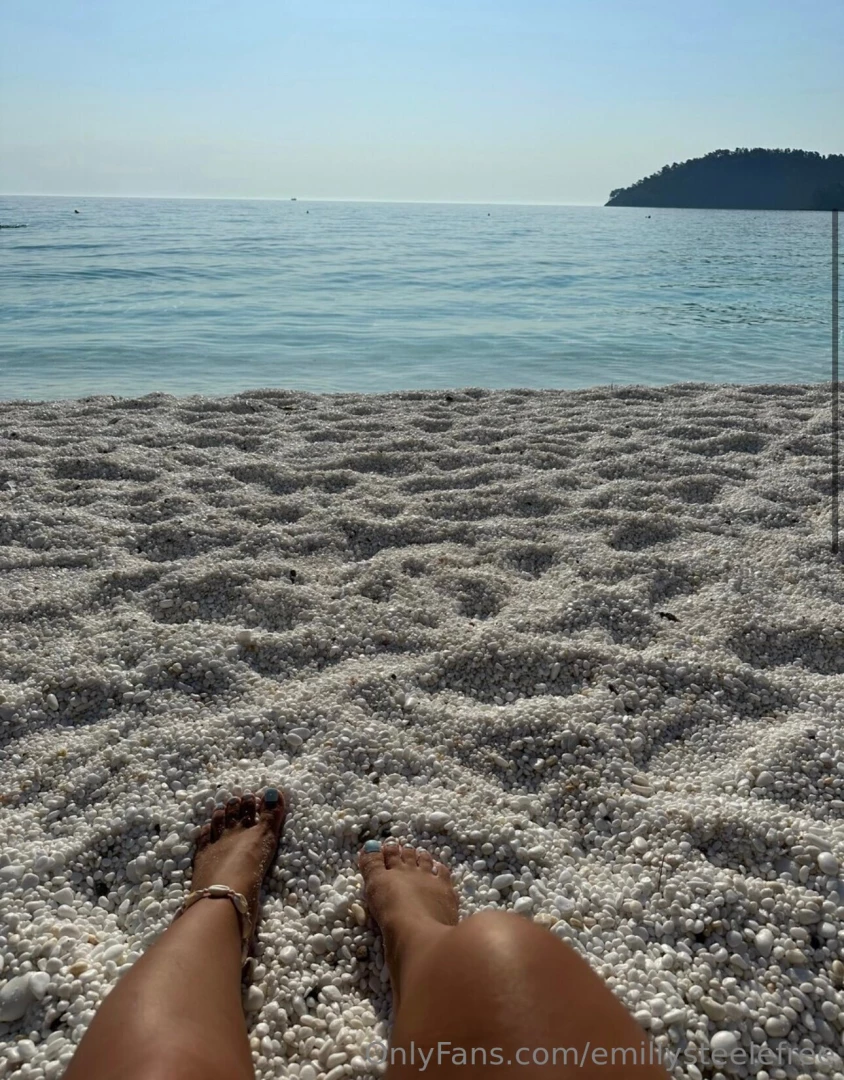 Feeling the warmth of the sun and the softness of the sand between my 
