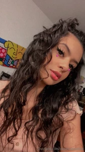 This is me in 2020 when i let my hair go curled and natural i only