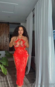 This red dress isn t just turning heads it s making you crave me