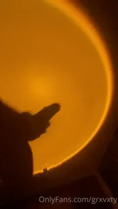 Cumshots over the sunset lamp 