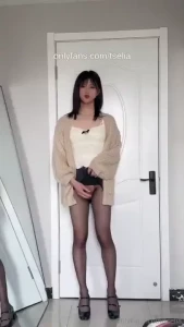 Cute transgender girl in miniskirt and stockings jerking her girl cock
