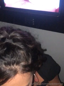 Sucking dick at the adult video booth