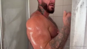 The lads get all soapy in the showers after a fun wrestling bout