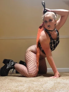 Posing with my fishnets collar boots and whip