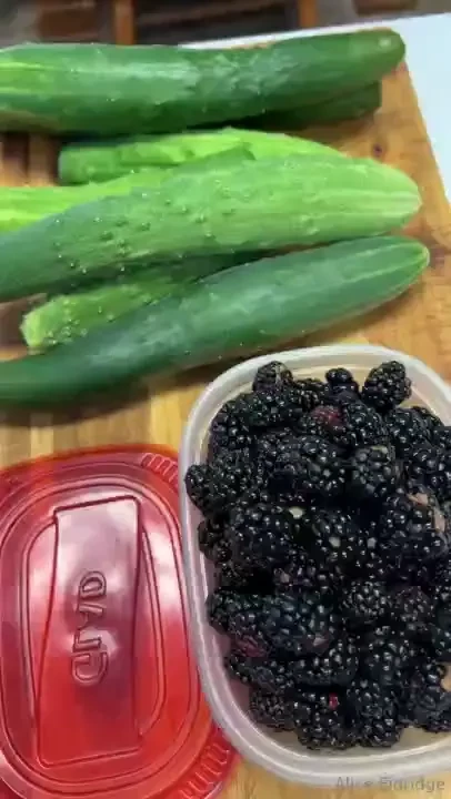 Showing the picking of cumcumbers and our blackberries with few blue 