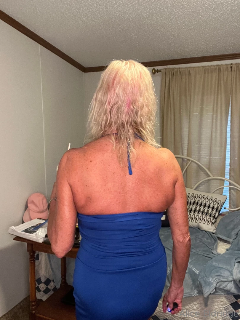 Modeling this royal blue dress with plunging neckline and cutouts in 