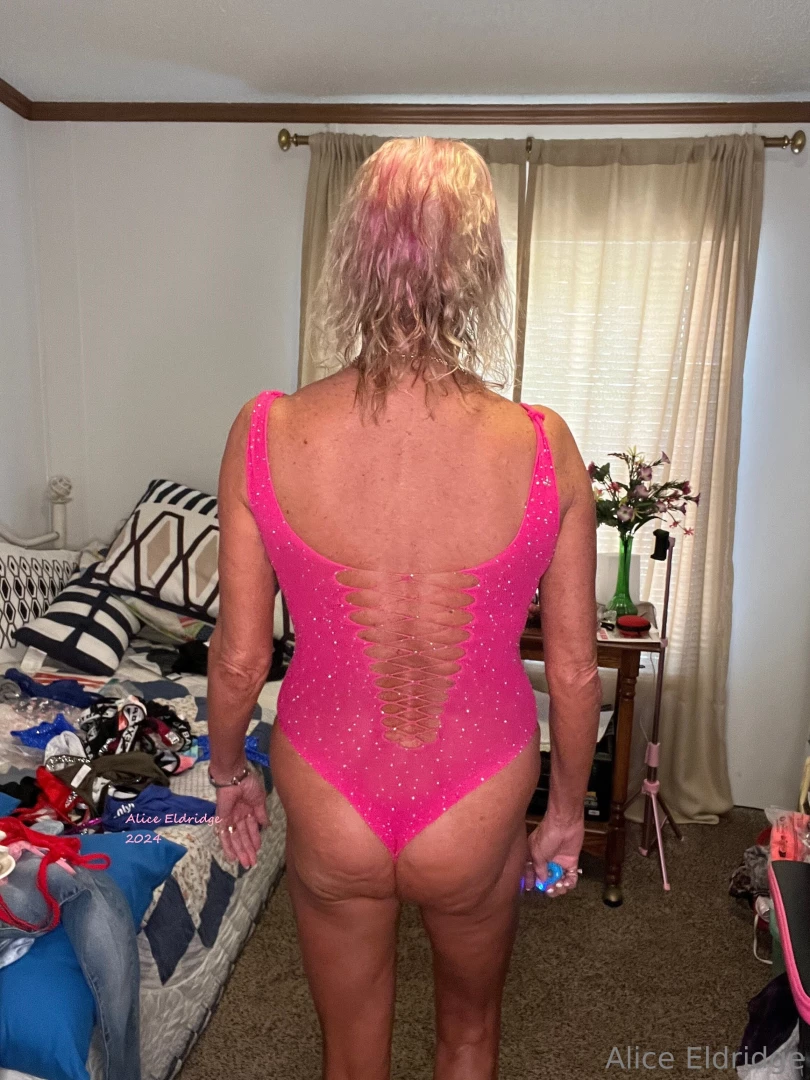 Pink body suit lingerie with cut outs and see through 