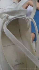Bare feet in sneakers i know it s your thing let me take them off