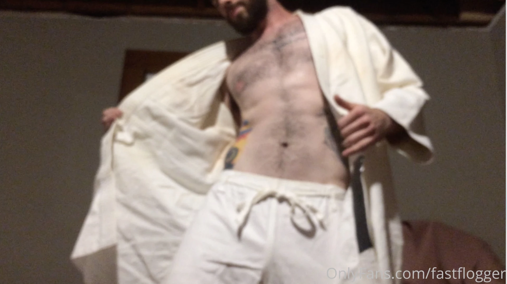 Karate gi strip tease i ll admit its a bit blurry but still hysterical 