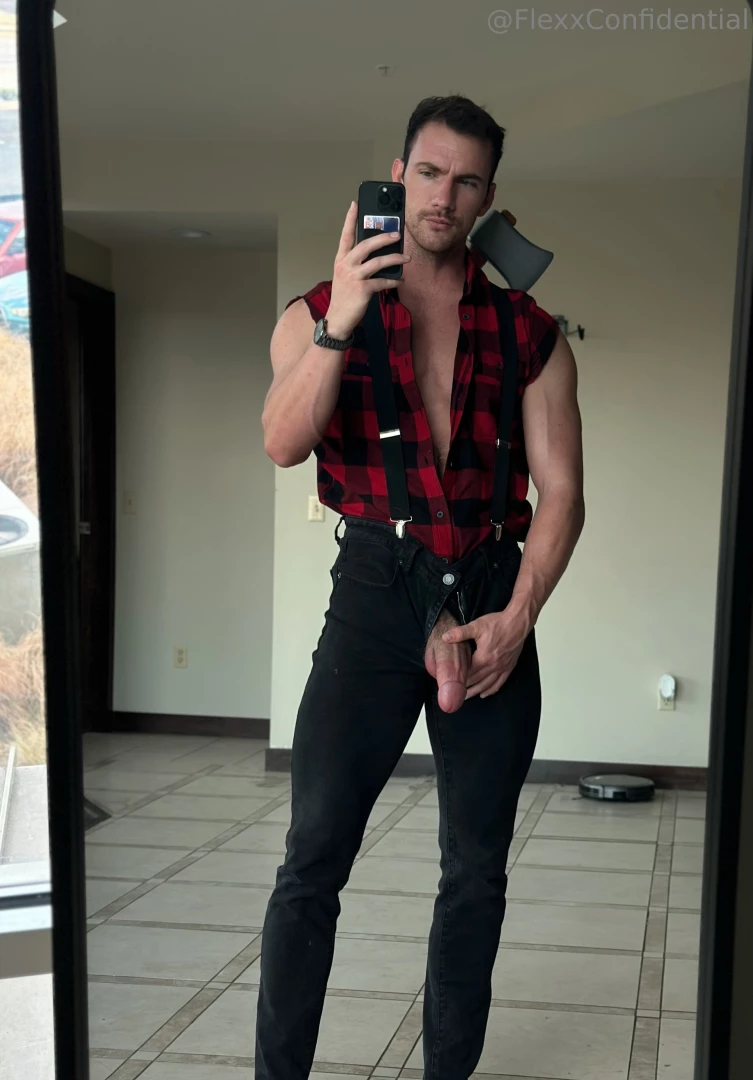 This lumberjack is ready to swing his axe 