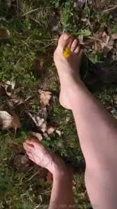 First barefoot frolic on the meadow this year grass tickling wood