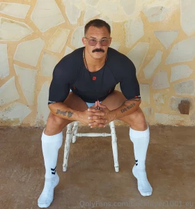 Coach sitting his big muscle ass down while he watches his boys play part 5