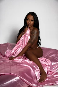 Wrapped up in nothing but silk and a whole lot of tease