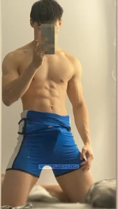 Trying out wrestling as a sport putting on a singlet for the first