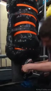 Part 1 of 9 b ll gagging a latex rubberdoll inverted and held still