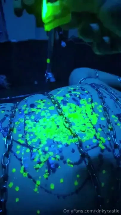 Slow motion uv wax play on a helplessly chained down sub 