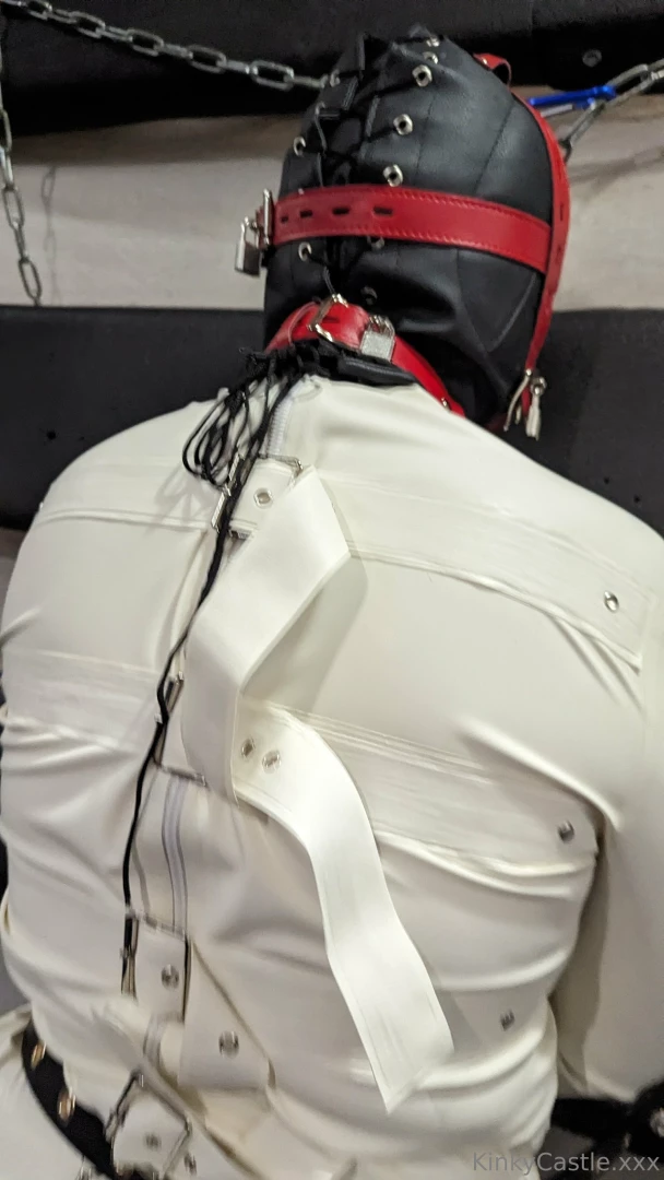 Padlocked hood latex straightjacket and legs held spread using tube part 3 