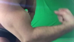 Intense ripped muscle flexing covered in oil 12 38