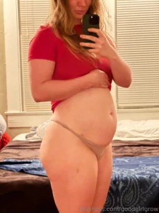 About to play with this round bloated stuffed belly while i fap myself