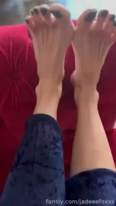 Resting on the couch closeup of my relaxed feet xon new pedicure