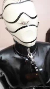 Rubberdoll raven enjoying her first total enclosure of latex