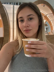 With a cup of coffee in her hand it s much more interesting to read