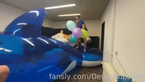 Popping loons on a big inflatable looner popping
