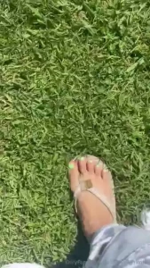 Getting my flip flop tan in