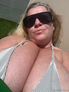 Tittys in tight bikini who s bringing the lotion