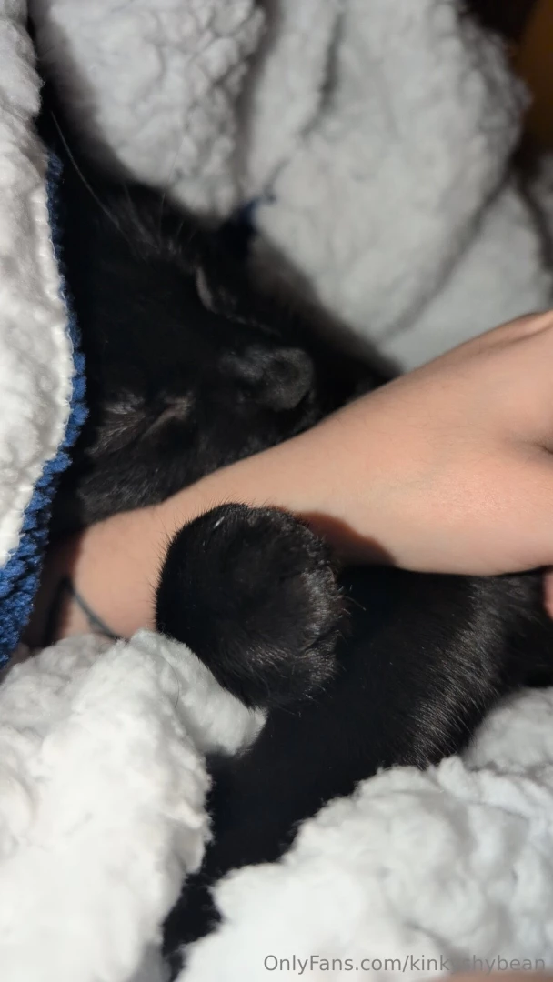 Heres my love holding my arm while he sleeps 