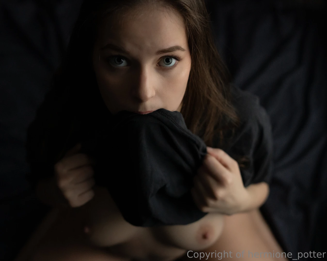 She s blushing while she bites her lip i think that halo s just for 