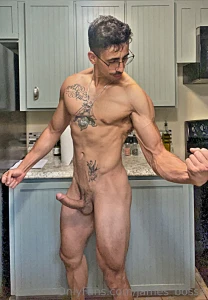 Flexing with a hard cock