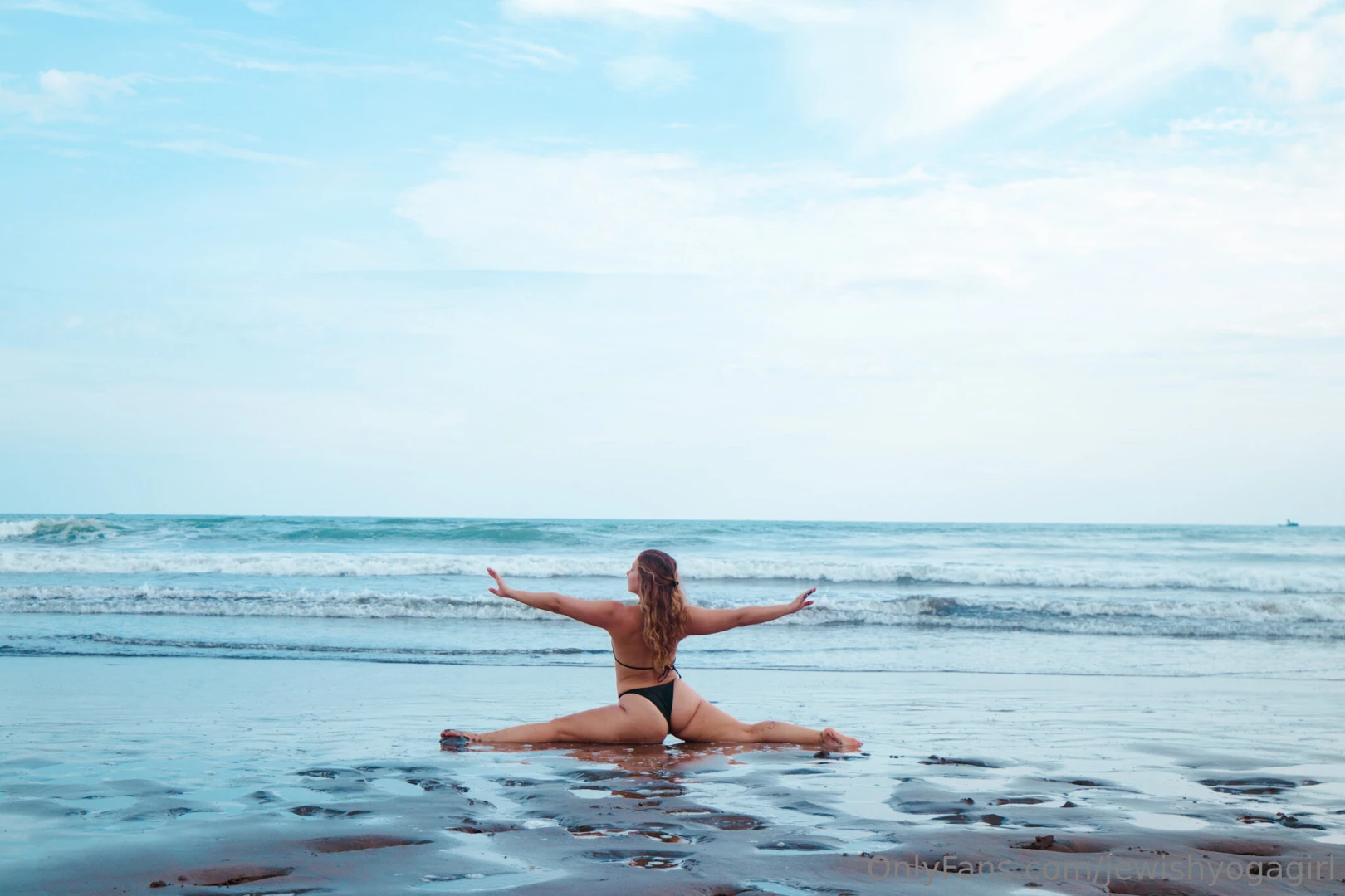 jewishyogagirl - Feeling the stretch in the splits pose flexibility balance and focus 